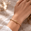 Anna K Jewelry - Armband Endless Knot Bangle Guld